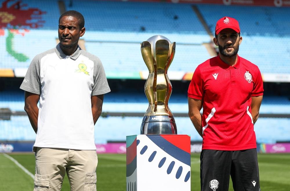 Adil Ramzi et Rulani Mokwena.