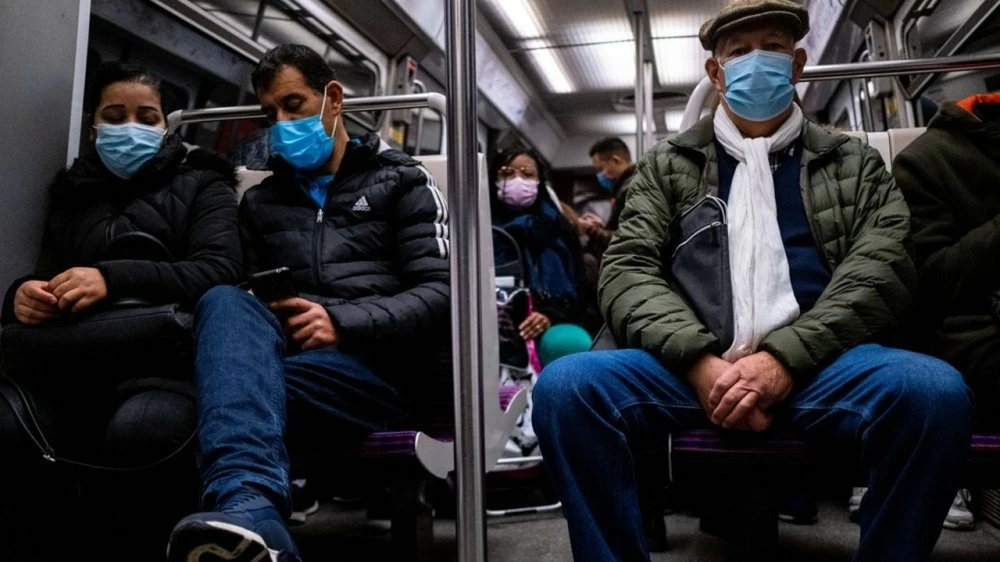 A file photo of commuters wearing masks in public transportation in Paris, France. France began lifting coronavirus restrictions including mandatory outdoor mask-wearing Wednesday Feb 2, 2022 in a bid to ease citizens' daily lives, dividing opinion as the country only last month reported record Covid-19 infections. EYEPRESS/Martin Bertrand
 Photo via Newscom/eyepress111937/EPN/Newscom/SIPA/2202162105