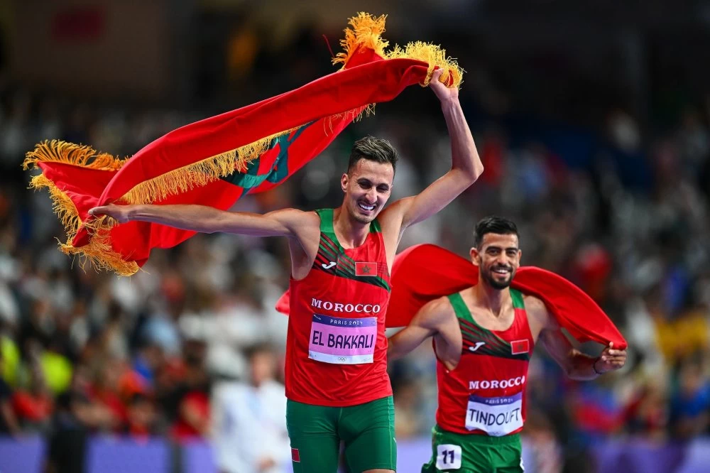 Soufiane El Bakkali et Mohamed Tindouft au terme de la course du 3.000 m steeple aux JO de Paris 2024. Ph. WorldAthletics