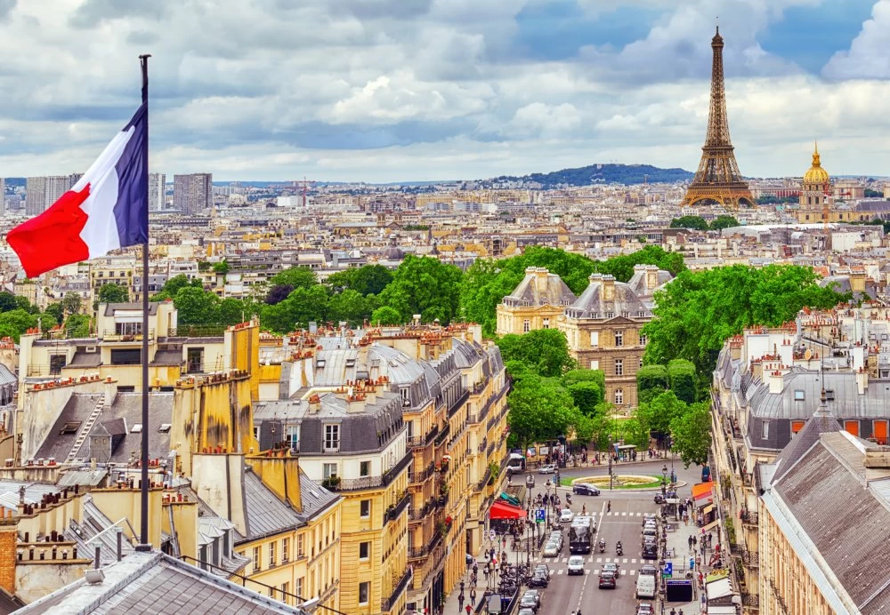 Beautiful panoramic view of Paris from the roof of the Pantheon. View of the Eiffel Tower and flag of France.